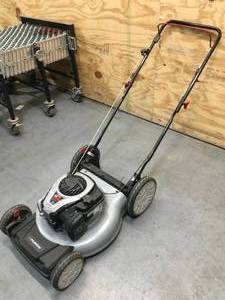 lot 10 image: Murray 21 in. 140 cc Briggs and Stratton Walk Behind Gas Push Lawn Mower Model # MNA152703