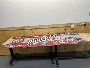 lot 126 image: MILWAUKEE 96 x 32 Vinyl Banner