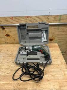 lot 127 image: MASTERFORCE Hammer Drill with Case and Extras
