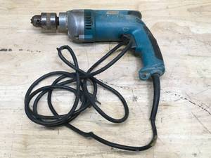 lot 152 image: Makita 7 Amp 12 in. 900 RPM Drill Model # DP4000