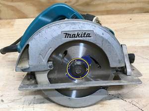 lot 154 image: Makita 7-14 Circular Saw Model # 5007F
