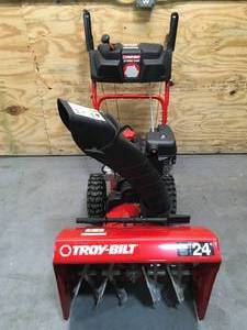 lot 5A image: Troy-Bilt Storm 2420 Gas Powered Self Propelled 24 Snow Blower Model # 31AS6KN2B23