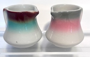 lot 22 image: Four Vintage Creamers