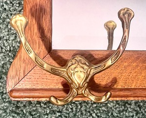 lot 97 image: Oak Framed Mirror With Antique Brass Double Coat Hooks