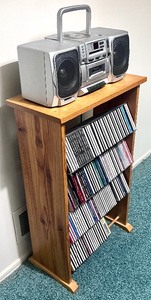 lot 150 image: CD Player, CDs and CD Shelf