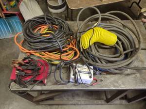 lot 483 image: Air Hoses, Cords, & Battery Charger...