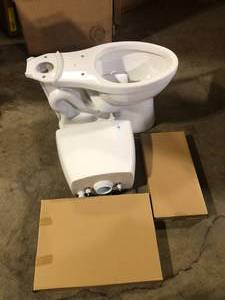 Delta Foundations 2-Piece 1.1 GPF1.6 GPF Dual Flush Elongated Toilet in White Customer Returns See Pictures