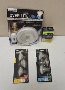 Sensor Brite  Feit Electric  Leviton Protection  Assortment of lights and Outlets