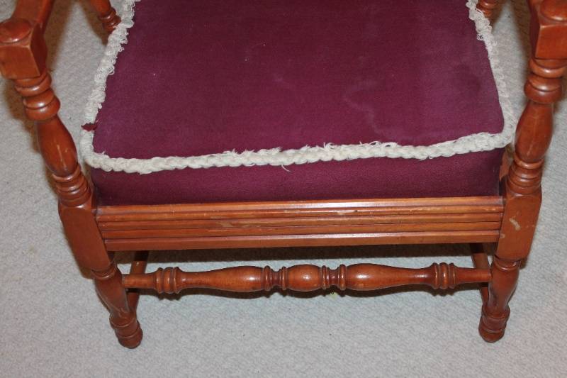 lot 69 image: Vintage Wooden Armchair with Burgundy Cushions