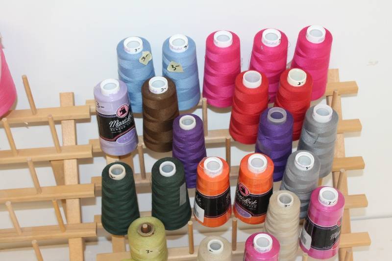 lot 9 image: Lot of Sewing Thread Spools with Wooden Rack and Metal Rack
