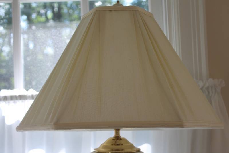 lot 26 image: Elegant Ceramic Table Lamp with Cutout Design and Fabric Shade