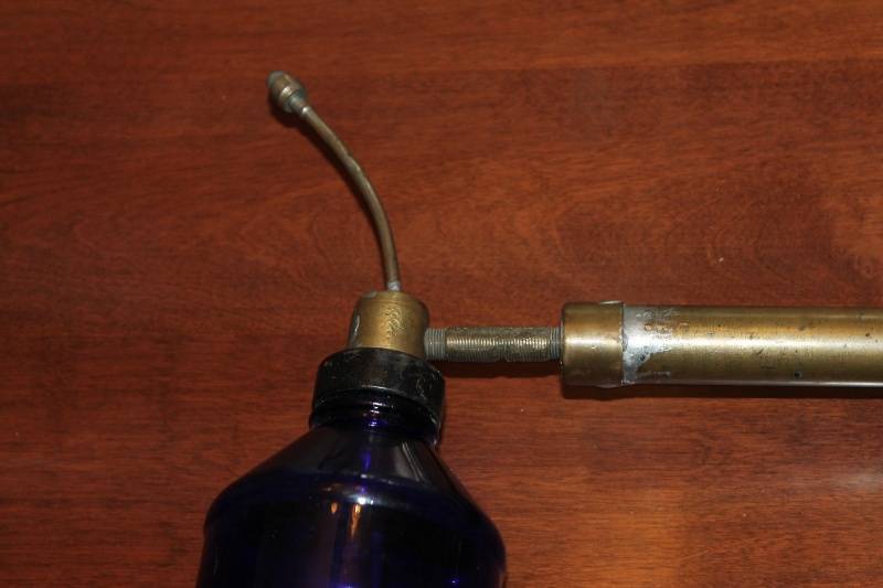 lot 37 image: Vintage Brass and Wood Hand Pump Oil Can