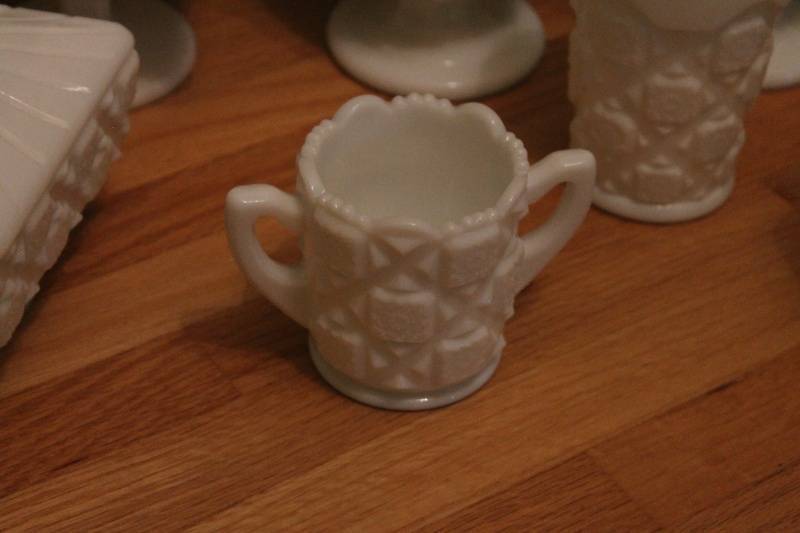 lot 48 image: Lot of Vintage Milk Glass Vases and Canisters