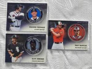lot 679 image: Lot of 3 - 2020 Commemorative Topps Player Medallion Cards Freddie Freeman #TPM-FF, Eloy Jiminez #TPM-EJ, Trey Mancini #TPM-TM