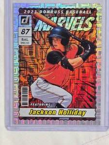 lot 64 image: Jackson Holliday Rookie 2023 Donruss Baseball #87 Marvels Foil - Baltimore Orioles