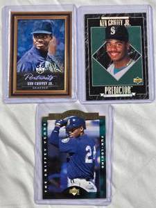 lot 113 image: Lot of 3 Ken Griffey Jr. Cards - 2018 Diamond Kings Portraits, 1996 Upper Deck A Cut Above, 1995 Upper Deck Predictor