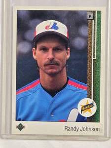 lot 120 image: Randy Johnson Rookie Card 1989 Upper Deck #25 - Montreal Expos