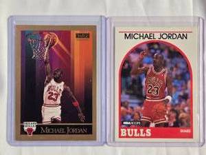 lot 311 image: Lot of 2 Michael Jordan 1990 Skybox #40, 1989 NBA Hoops #200