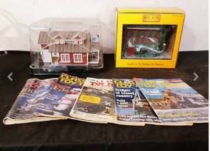 lot 102 image: Rail King Toy Railroad Buildings, Menards Country Store & Toy Train Magazines