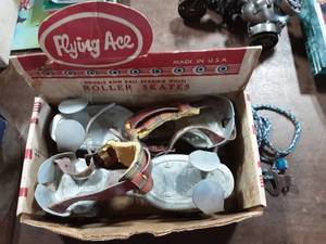 lot 10 image: Vintage Flying Ace Ball Bearing Strap On Roller Skates With Key