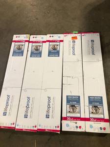 lot 34 image: Lot of 5 cases Lifeproof Champagne Beach Wood 30 MIL x 8.7 in. W x 48 in. L Click Lock Waterproof Luxury Vinyl Plank Flooring (20.1 sqftcase) customer Returns see pictures