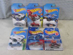 lot 189 image: (EC1) Assorted Hot Wheels in Packag...