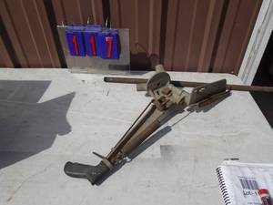 Vintage cast aluminum clay pigeon thrower with only 1 leg. As shown.