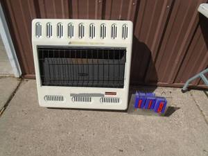 Wall mount heater. Appears to be 30000 btu. Was working. Untested. As shown.