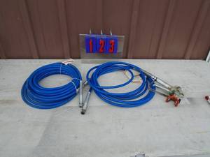 Graco air spray gun & 2 hoses. As shown.