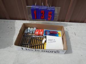Flat of quick couplers, locks & misc. As shown.