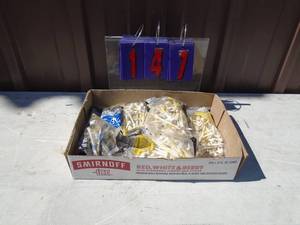 Flat of golf tees. As shown.