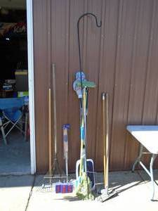 Assortment of outdoor tools & shredded crooks mops & etc. As shown.
