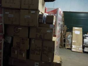 Cart of New Overstocks and Unclaime...