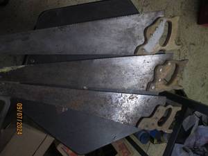 3 hand saws...