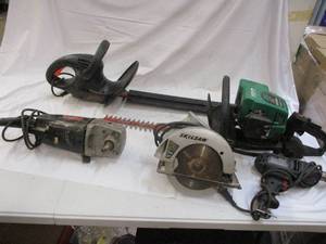 Lot of power tools. Hedge trimmers,...