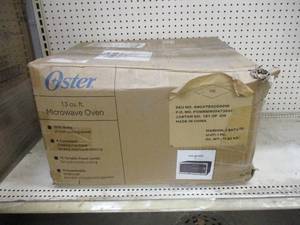 Oster 1.3 cu ft microwave oven 1000...
