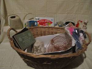 Wicker basket with handles, tin box...