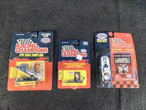 Three Vintage Racing Champions Diecast Cars 2002 Jim Dunn, 1997 Rhonda Hartman, and 1996 Tim Wilkerson