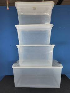 Four Sterilite Storage Containers with Lids
