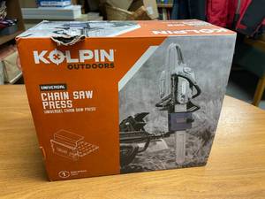 lot 9 image: Kolpin Chain Saw Press