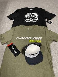 lot 83 image: (2) Size Medium T-Shirts & Cap Polaris & Can-Am