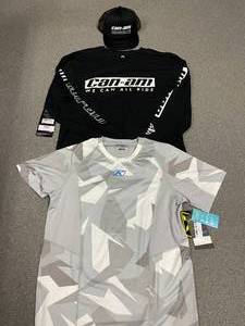 lot 84 image: (2) Size Large Shirts and Cap Can-Am & Klim