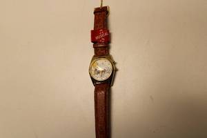 lot 24 image: Armitron Collectibles Musical Peanuts Character Watch