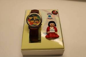 lot 46 image: World Vision Time to Share Watch and Figure Set