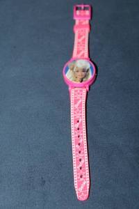 lot 105 image: Vintage Barbie Pink Wristwatch with Character Image