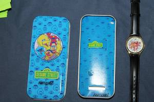 lot 122 image: Sesame Street Watch in Collectible Tin Case