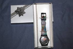 lot 217 image: MCI Logo Watch with Colorful Patterned Strap in Gift Box