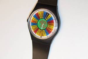 lot 36 image: Stylish Black Wristwatch with Colorful Dial