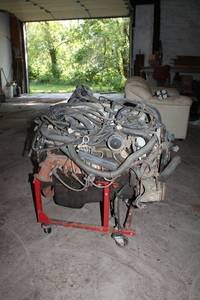 lot 11 image: Used Automotive Engine with Stand