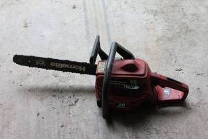 lot 25 image: Homelite 16-Inch Gas Chainsaw